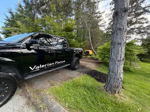 Valerian Fence local service truck in Halifax Valerian Fence service truck parked at a Halifax project site