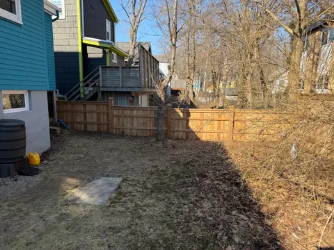 Wood fence along a side yard